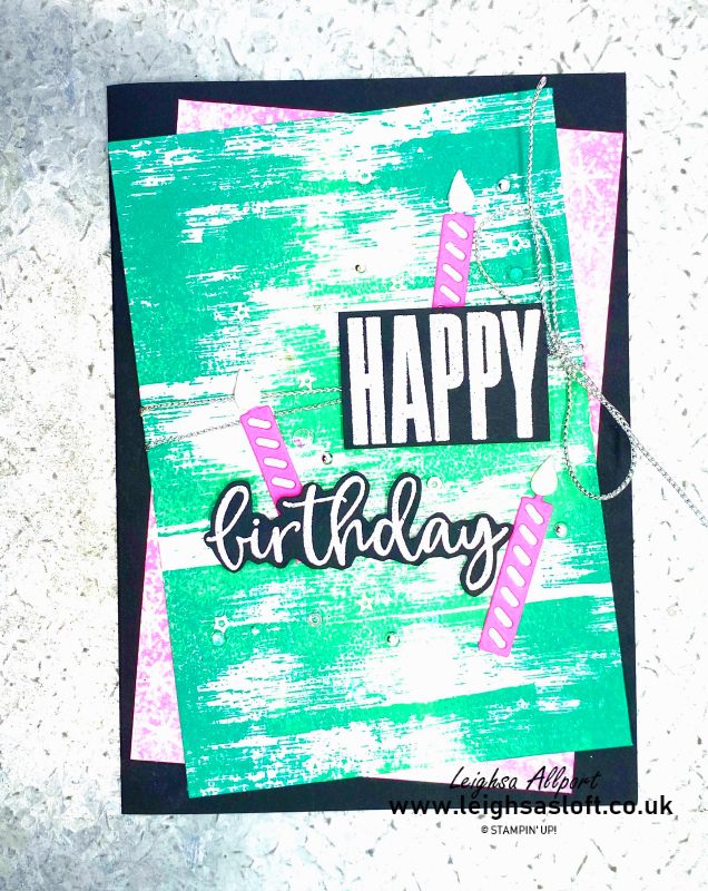 Drybrush background with Coastal Cabana and Bermuda Bay. Happy Birthday, white heat embossed onto black. Polished Pink candles and silver twine